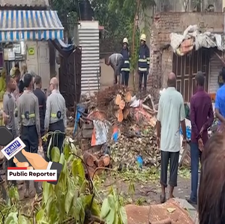2 shops heavily damaged by a fallen tree at Mahim Kapad Bazaar, 02 people were found injured while rescue operations